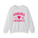 Grey crewneck sweatshirt with 'ADORABLE UNIVERSITY EST 2023' printed in pink on the front.