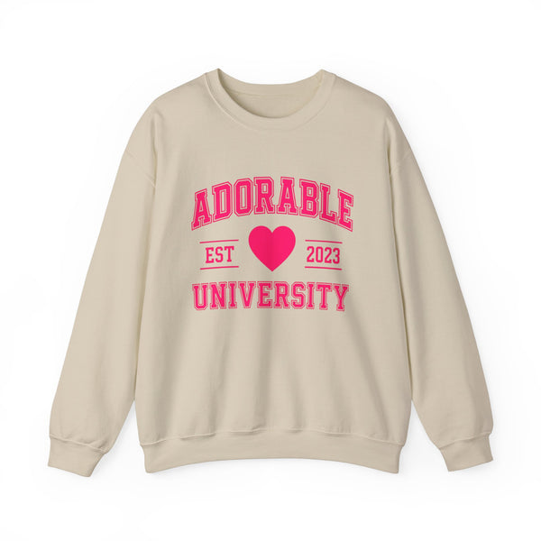 Beige crewneck sweatshirt with 'ADORABLE UNIVERSITY EST 2023' printed in pink on the front.
