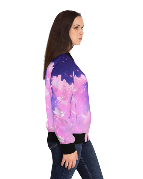 Woman wearing a colorful bomber jacket with a pink and purple design on a white background