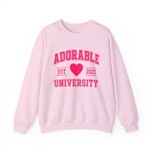 Light pink crewneck sweatshirt with 'ADORABLE UNIVERSITY EST 2023' printed in pink on the front.
