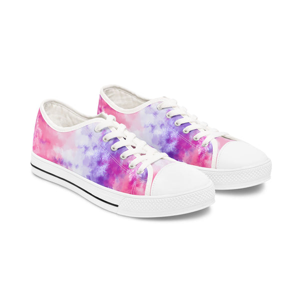 Pair of tie-dye sneakers with white laces on a white background