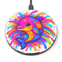 Round wireless charging pad with a colorful dolphin design on a white background