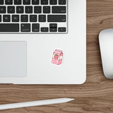 Anime-style strawberry milk carton sticker with a cute strawberry on a white background on laptop