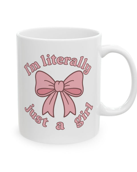 White mug with pink bow and text on a white background