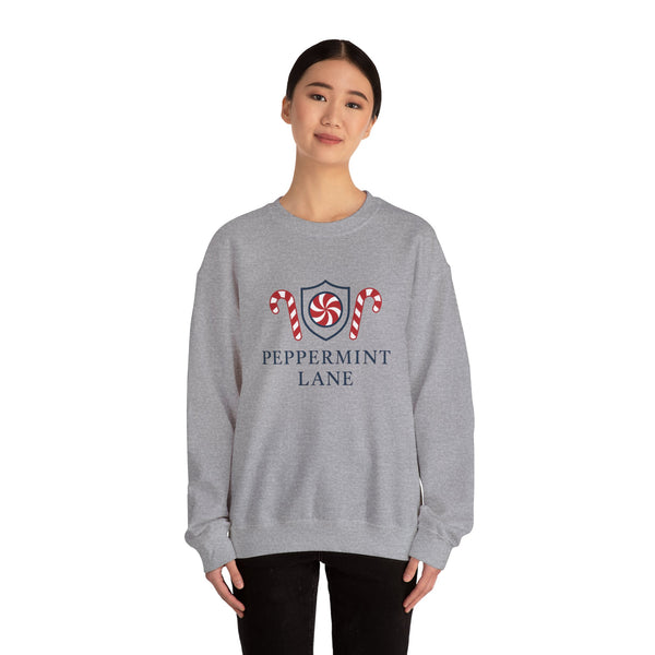 Person wearing a gray sweatshirt with 'Peppermint Lane' design on a white background