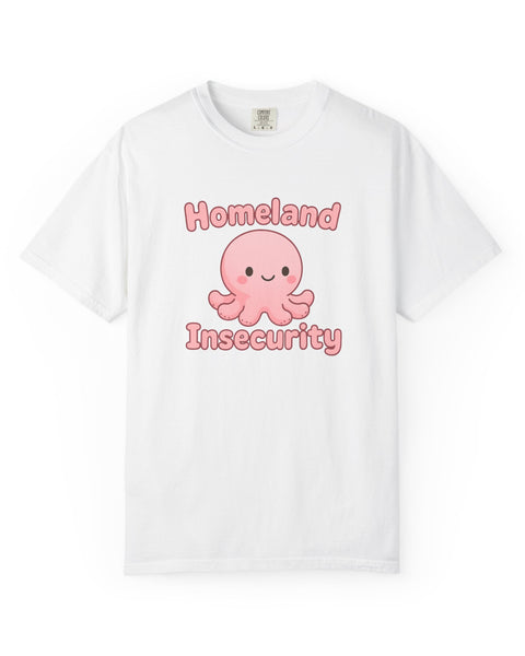 White t-shirt with a graphic of a pink octopus and the text 'Homeland Insecurity' printed above it.