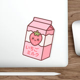 Anime-style strawberry milk carton sticker with a cute strawberry on a white background on laptop
