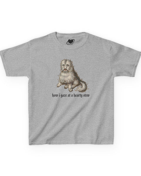 A sport grey baby tee featuring a vintage-style illustration of a medieval dog meme and the text 'how i gaze at a hearty stew' printed on the front.