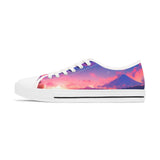 Sneaker with a colorful sunset design on a white background