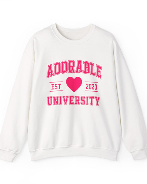White crewneck sweatshirt with 'ADORABLE UNIVERSITY EST 2023' printed in pink on the front.