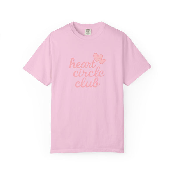 Pink t-shirt with 'heart circle club' text and heart graphics on a white background
