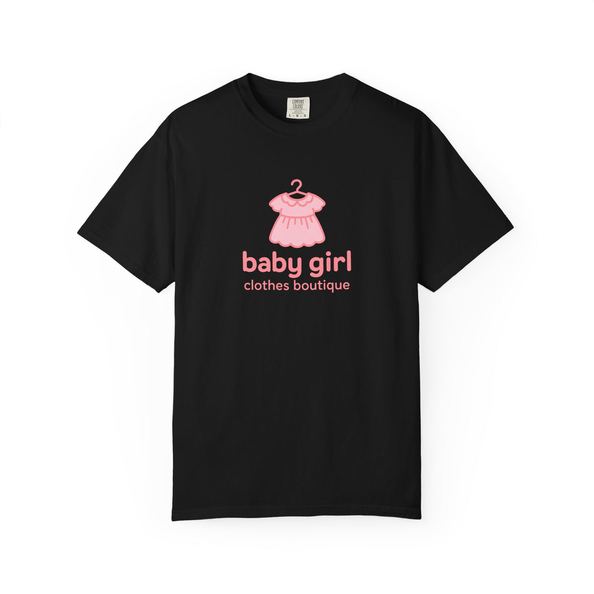 Black t-shirt with pink baby dress graphic and text on a white background