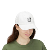 Person wearing a white cap with 'heart circle club' text on a white background