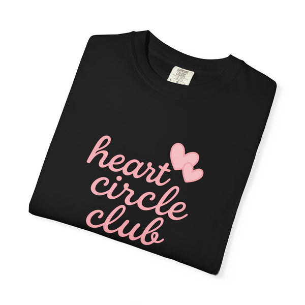 Black t-shirt with 'heart circle club' text and pink heart design on a white background