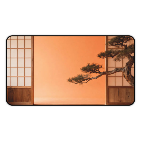 Large desk mat with a surreal landscape with a bonsai tree against an orange sky and Japanese wooden panels.