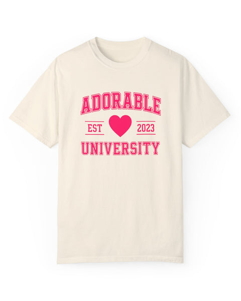 Ivory crew neck t-shirt with the text 'ADORABLE UNIVERSITY EST 2023' printed in red, heart symbol replacing the year.