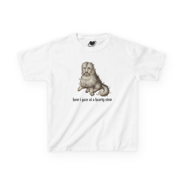 A white baby tee featuring a vintage-style illustration of a medieval dog meme and the text 'how i gaze at a hearty stew' printed on the front.