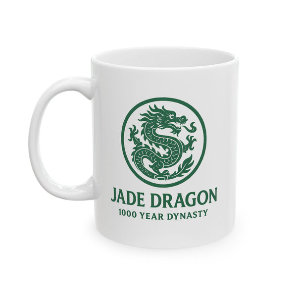 White mug with green dragon design and text on a white background