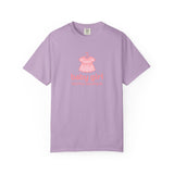 Purple t-shirt with pink baby dress graphic and 'baby girl' text on a white background