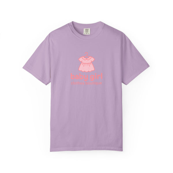 Purple t-shirt with pink baby dress graphic and 'baby girl' text on a white background