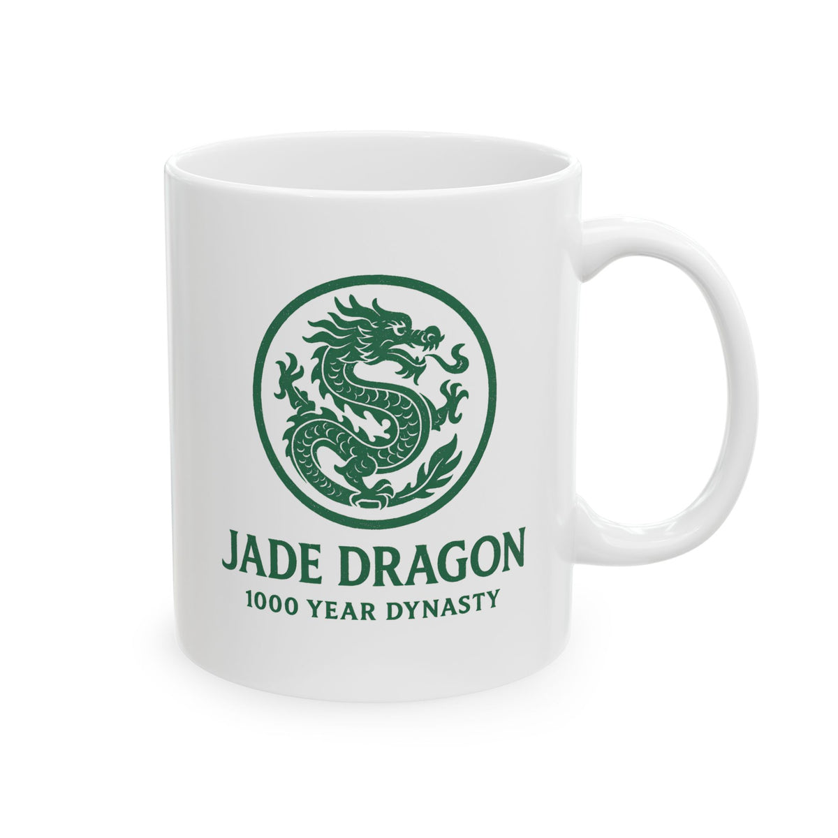 White mug with green dragon design and text on a white background