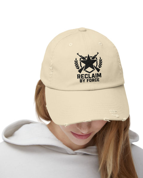 Beige cap with black logo and text worn by a person on a white background