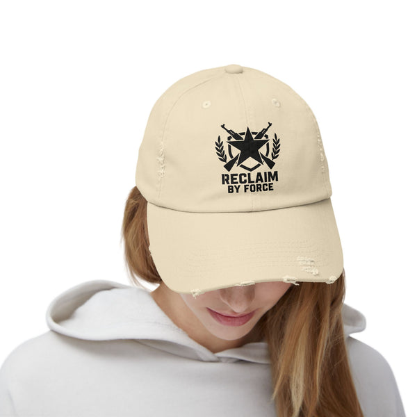 Beige cap with black logo and text worn by a person on a white background