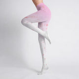 form fitting anime tights with pink floral pattern worn by a woman on a light gray background