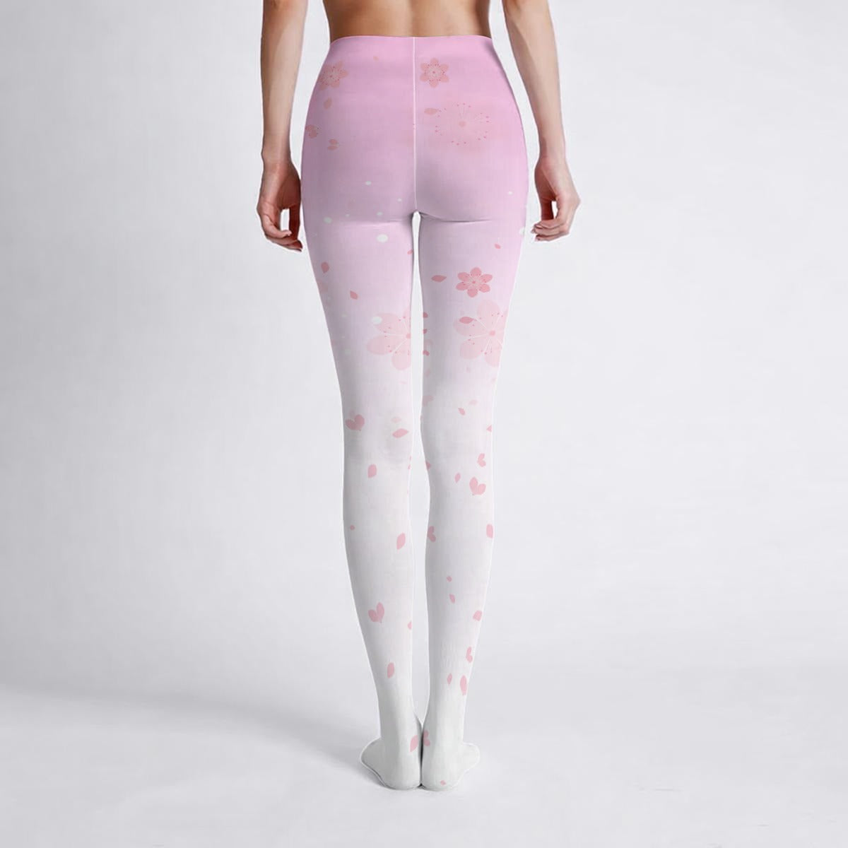 Rear view of a slim woman wearing anime tights with pink floral pattern 