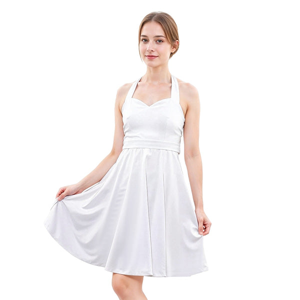 woman wearing a white halter top dress on a white background