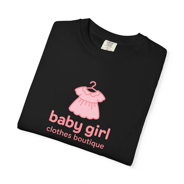Black t-shirt with pink dress graphic and 'baby girl clothes boutique' text on a white background