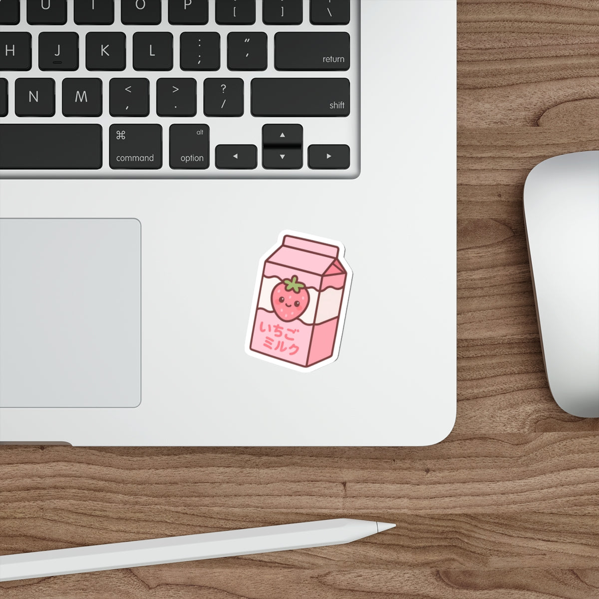 Anime-style strawberry milk carton sticker with a cute strawberry on a white background on laptop