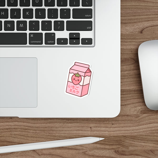 Anime-style strawberry milk carton sticker with a cute strawberry on a white background on laptop
