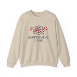 Beige sweatshirt with 'Peppermint Lane' design featuring candy canes and a shield on a white background.