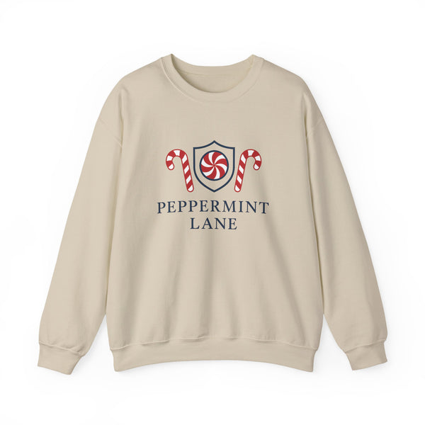 Beige sweatshirt with 'Peppermint Lane' design featuring candy canes and a shield on a white background.