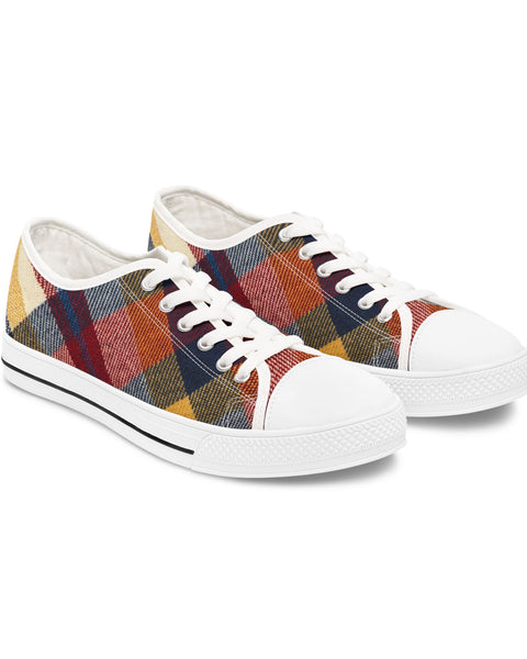 Pair of plaid sneakers on a white background