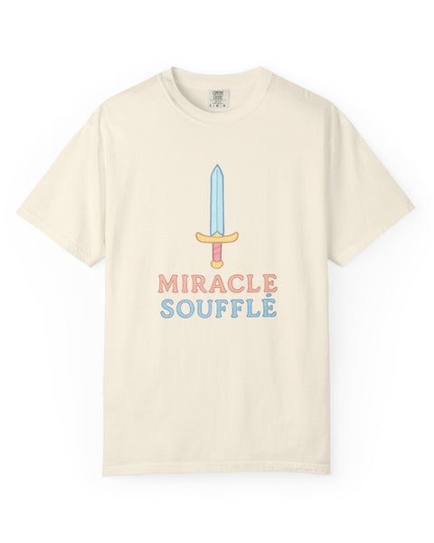 Beige t-shirt with 'Miracle Souffle' text and sword graphic on a white background