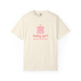 Beige t-shirt with pink baby dress graphic and 'baby girl clothes boutique' text on a white background