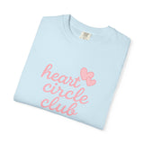 Light blue t-shirt with 'heart circle club' text and pink heart design on a white background