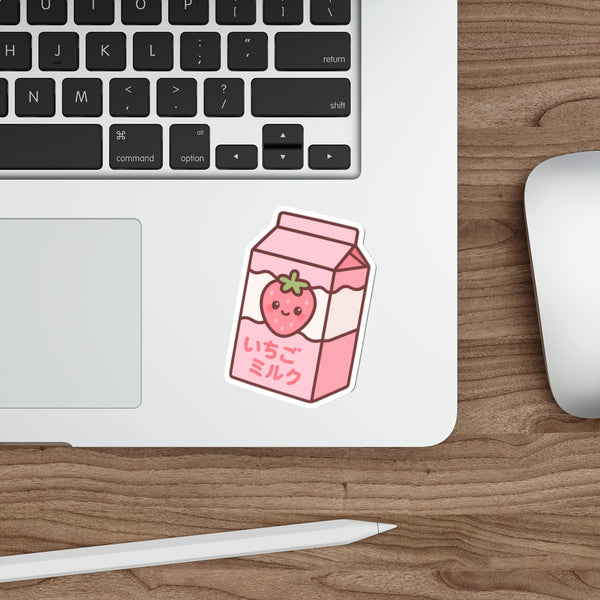 Anime-style strawberry milk carton sticker with a cute strawberry on a white background on laptop