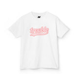 White t-shirt with pink 'trouble' text on a white background