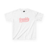 White t-shirt with pink 'trouble' text on a white background