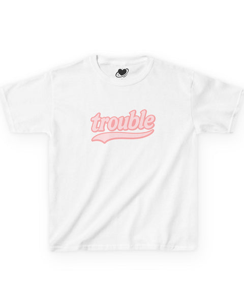 White t-shirt with pink 'trouble' text on a white background