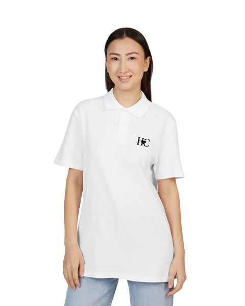 Person wearing a white Heart Circle polo shirt with a logo on a white background
