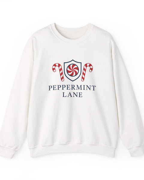 White sweatshirt with 'Peppermint Lane' design featuring candy canes and a shield on a white background.