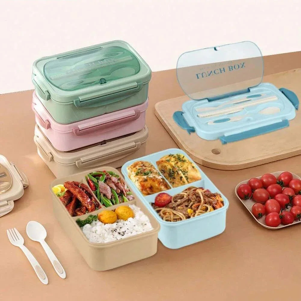 Set of colorful bento boxes with food compartments on a wooden surface.