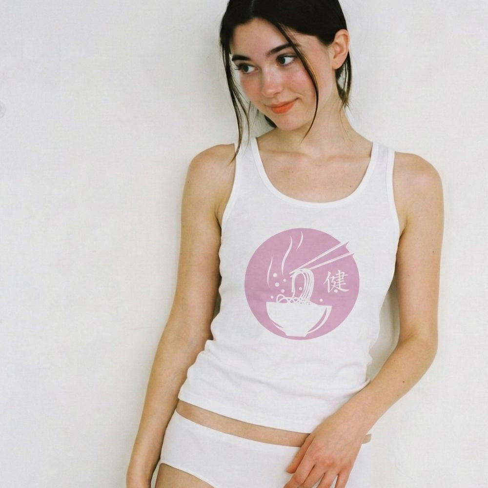 Woman wearing a white tank top with a pink ramen logo on a plain background