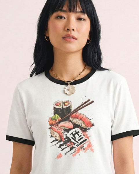 Woman wearing a vintage white t-shirt with sushi graphic on a pink background